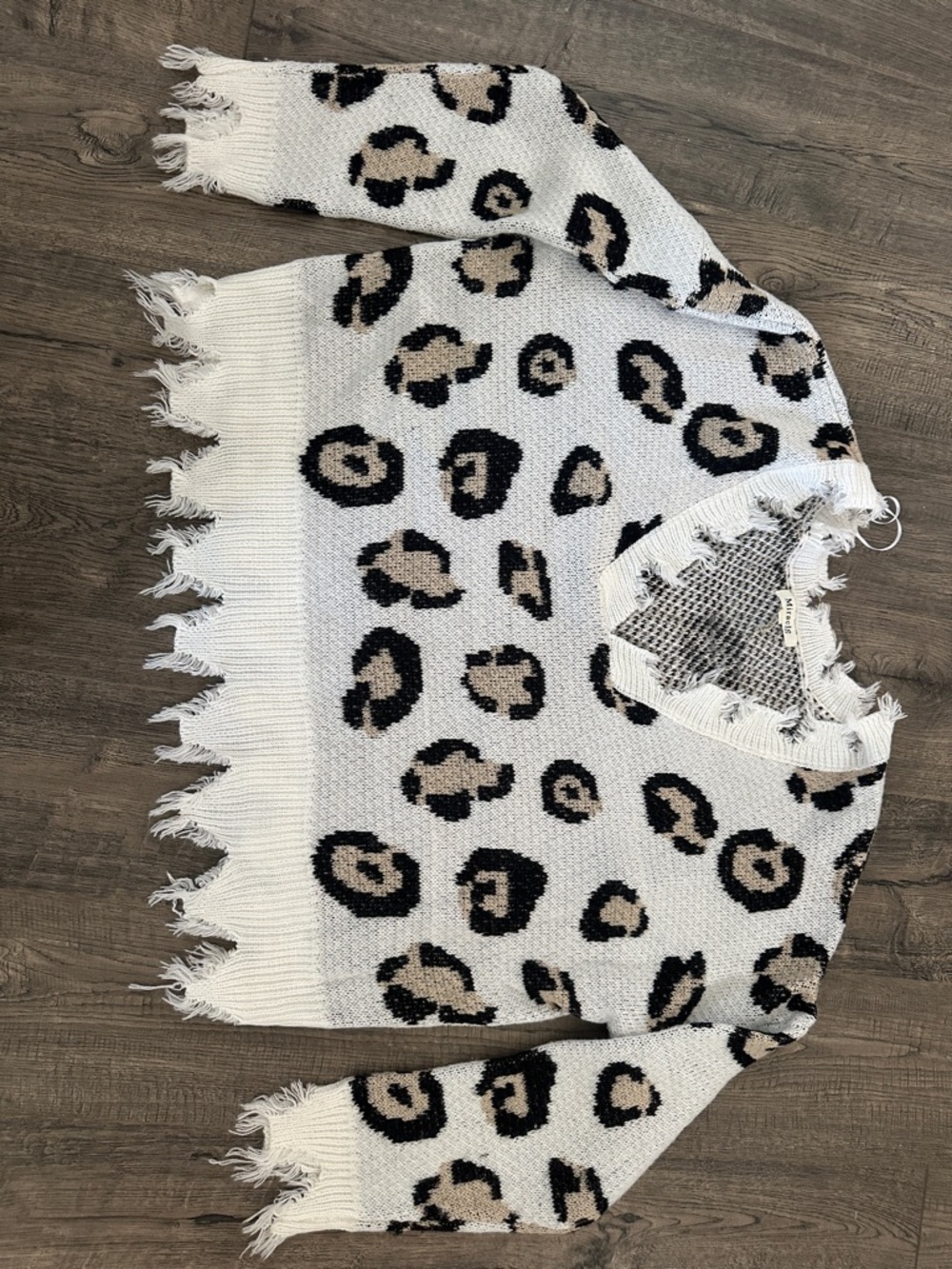 Cheetah print distressed sweater